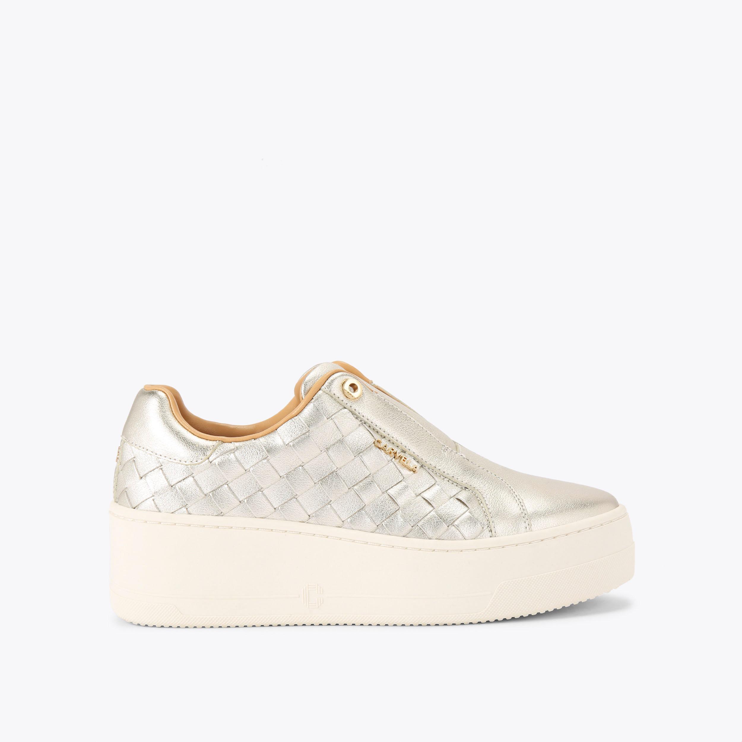 CONNECTED LACELESS WEAVE Gold Woven Trainer by CARVELA