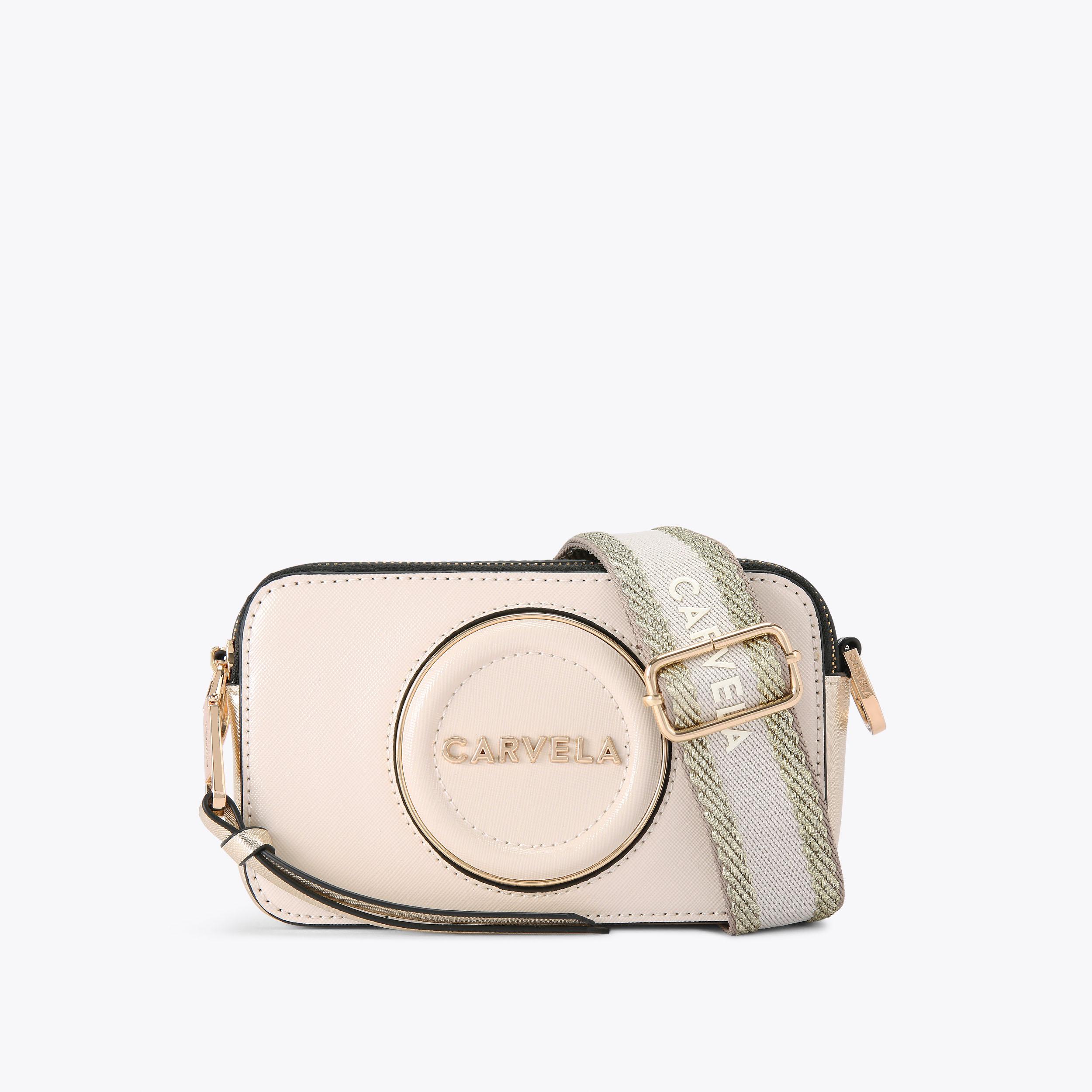 MINI ROMA CIRCLE Bone Camera Bag by CARVELA