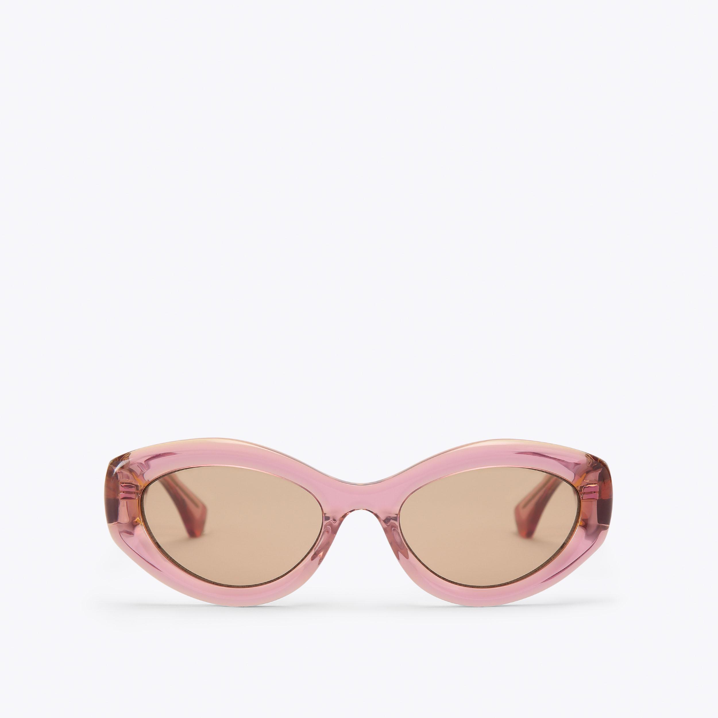 Kurt Geiger KGL1008 Cat-Eye Sunglasses in a blush/nude pink colorway. KENSINGTON SM CAT-EYE Pale Pink Cat Eye Sunglasses by Kurt  main image 4