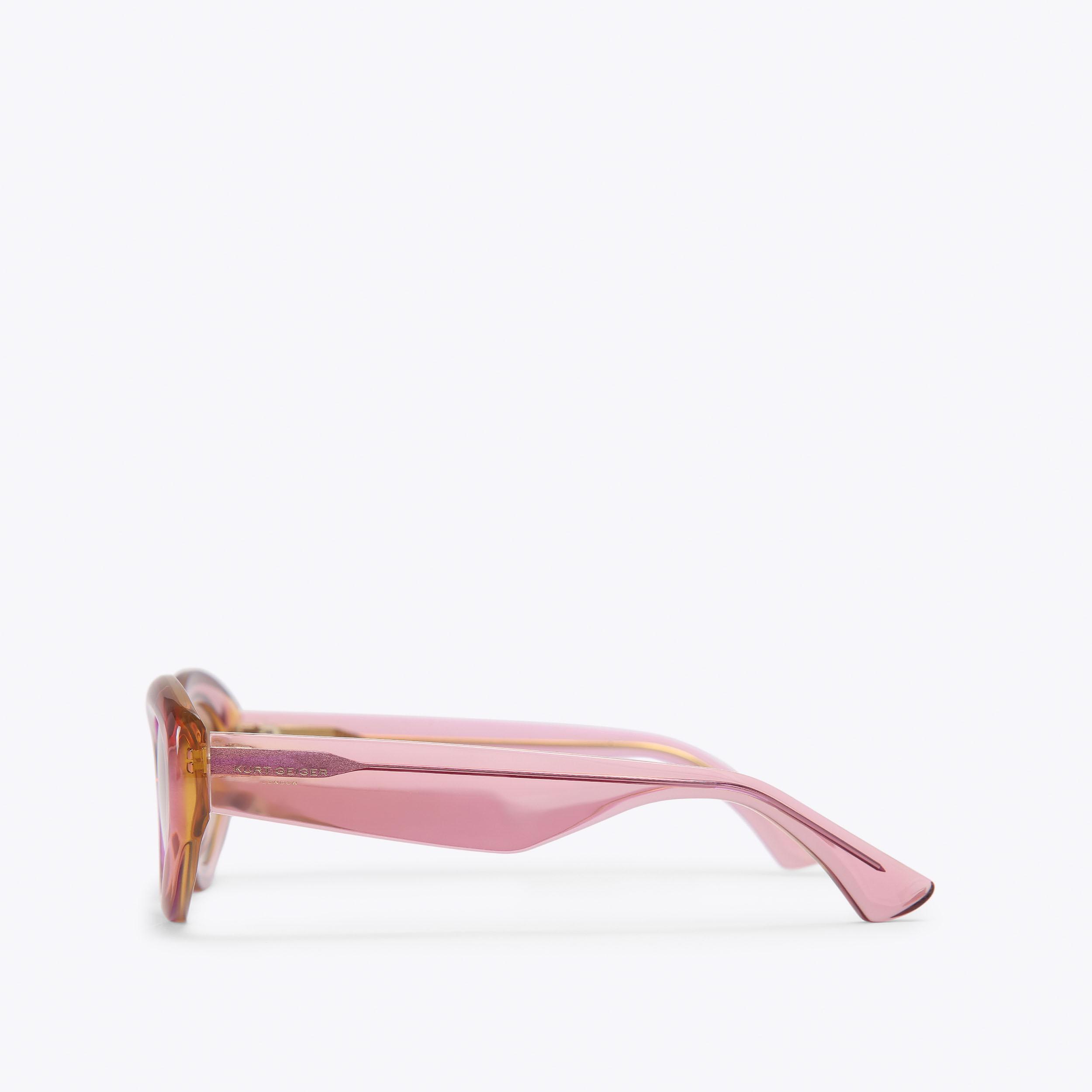Kurt Geiger KGL1008 Cat-Eye Sunglasses in a blush/nude pink colorway. KENSINGTON SM CAT-EYE Fuchsia Acetate Cat Eye Sunglasses by  main image 4